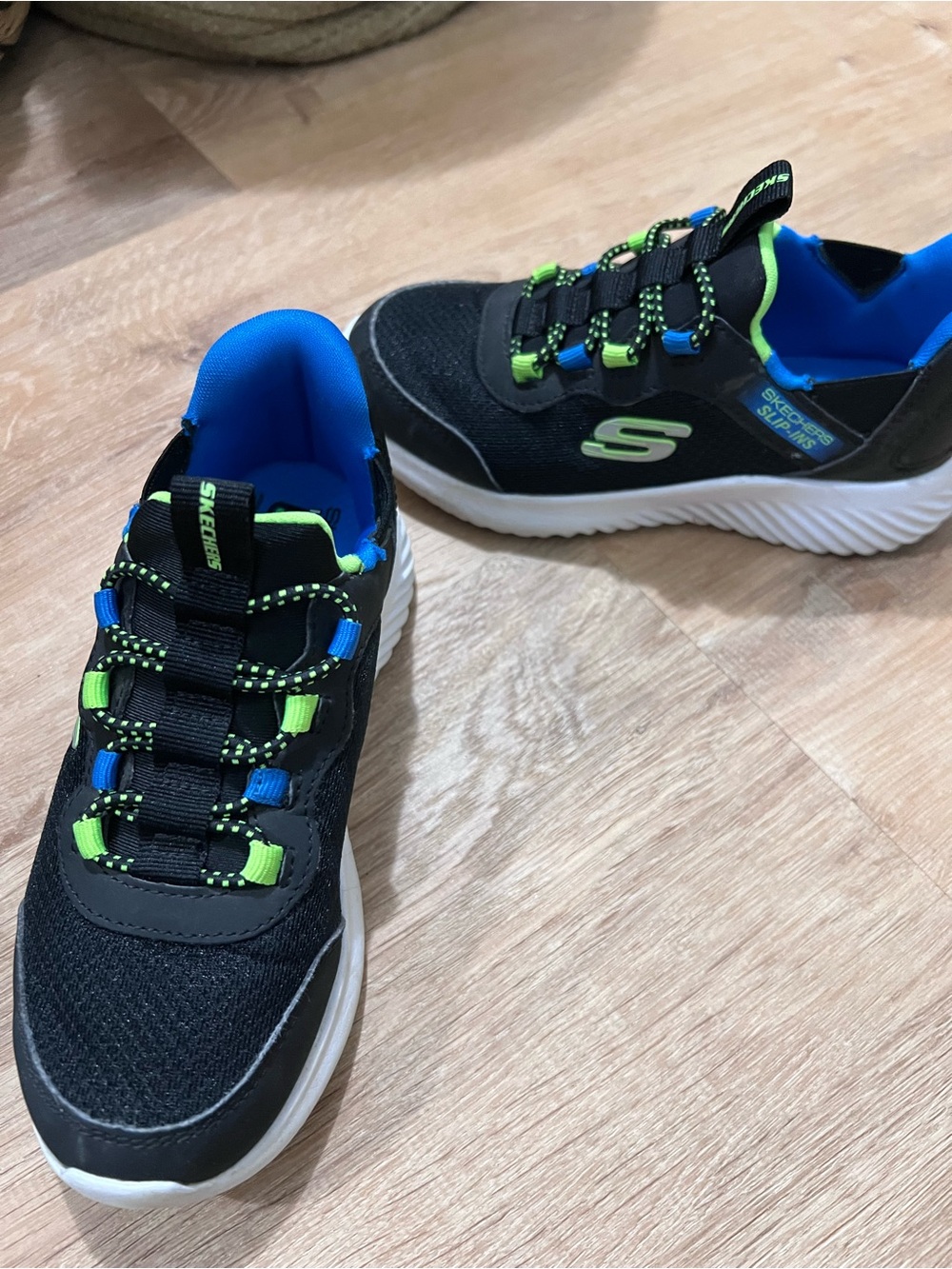 Skechers Kids Black Sneakers with Blue and Neon Green Accents